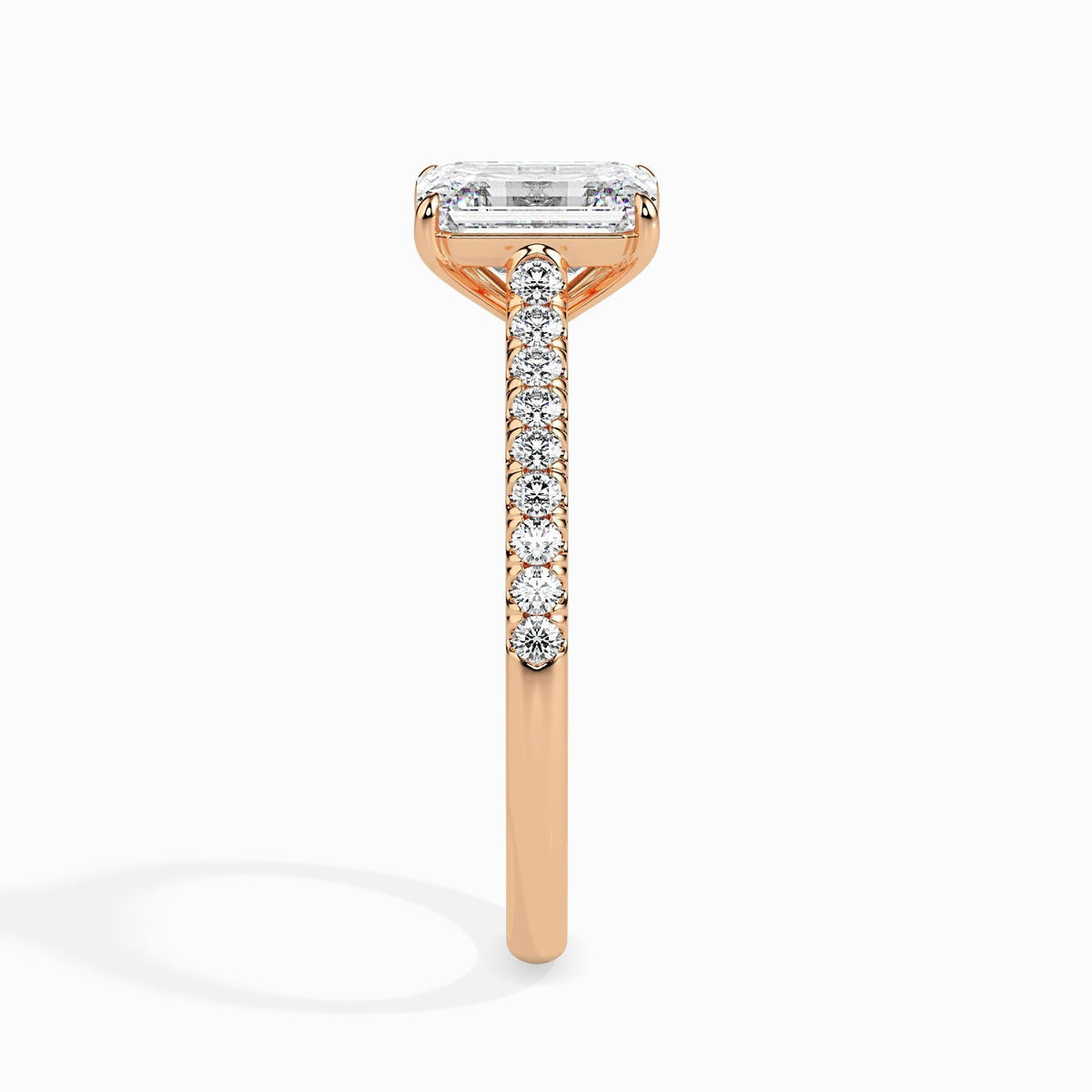 50 Cent Emerald Solitaire Ring in Diamond Band