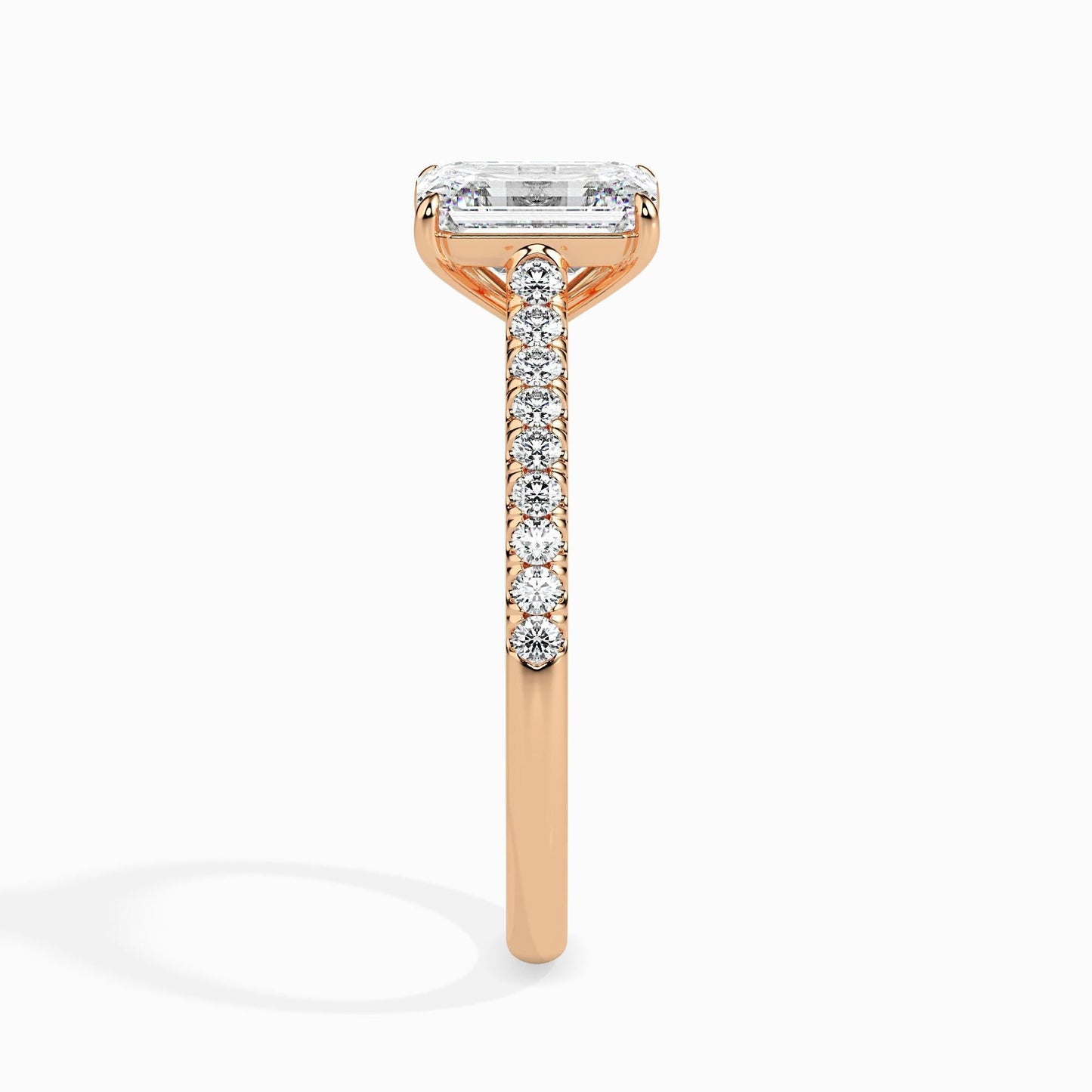 50 Cent Emerald Solitaire Ring in Diamond Band